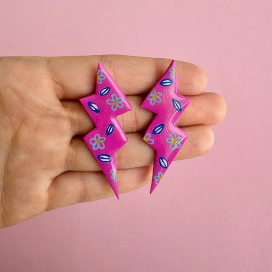 Aros – Rayos fucsia